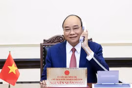 Президент Вьетнама Нгуен Суан Фук провел телефонный разговор с избранным президентом Республики Корея. (Фото: ВИА)
