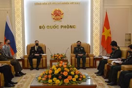 На встрече. (Фото: qdnd.vn)
