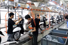 Производственная линия на «умном» заводе Yadea Vietnam с объёмом инвестиций более 100 млн долларов США в промышленной зоне Танхынг провинции Бакнинь. Фото: ВИА.