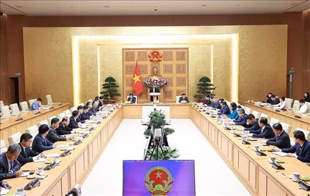 Премьер-министр встретился с руководителями вьетнамских представительств за рубежом ảnh 1