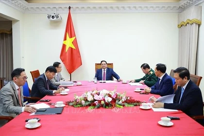 Премьер-министр Фам Минь Тьинь провёл телефонный разговор с Премьер-министром Малайзии Анваром Ибрагимом (Фото: ВИА)