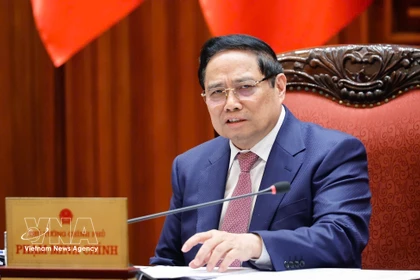 Премьер-министр Фам Минь Тьинь председательствует на заседании Постоянного комитета Правительства по вопросам стимулирования драйверов роста с целью обеспечения макроэкономической стабильности (Фото: ВИА)