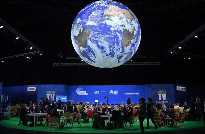 Делегаты на Конференции сторон РКИК ООН (COP26) в Глазго, Шотландия, 2 ноября 2021 года. Фото: AFP/ВИА