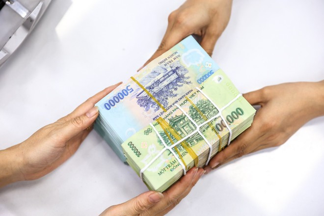 Общий объём кредитного портфеля всей банковской системы достиг 16,23 квадриллиона донгов, что на 3,93% больше по сравнению с концом 2024 года — почти в три раза выше прироста в 1,34% за аналогичный период прошлого года. (Фото: Vietnam+) viettin-bank-18.jpg