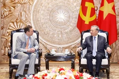 Генеральный секретарь То Лам принимает председателя и главного исполнительного директора корпорации GE Vernova Скотта Стразика. (Фото: ВИА)