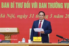 Выступает секретарь партийного комитета Правительства, Премьер-министр Правительства Фам Минь Тьинь. (Фото: ВИА)