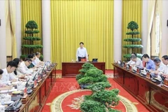 Президент государства Лыонг Кыонг выступает на совещании. (Фото ВИА)