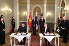 Генеральный секретарь То Лам и Президент Финляндии Александр Стубб присутствуют при церемонии подписания меморандума о взаимопонимании между Министерством финансов Вьетнама и Министерством иностранных дел Финляндии. (Фото: ВИА)