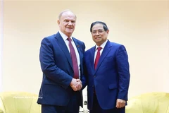 Премьер-министр Фам Минь Тьинь принимает товарища Геннадия Зюганова, Председателя Коммунистической партии Российской Федерации. (Фото: ВИА)