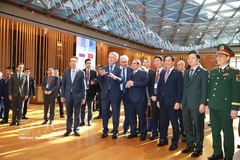 Премьер-министр Фам Минь Тьинь прибыл с визитом и провёл рабочую встречу с руководством компании Novatek. (Фото: ВИА)