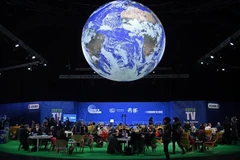 Делегаты на Конференции сторон РКИК ООН (COP26) в Глазго, Шотландия, 2 ноября 2021 года. Фото: AFP/ВИА