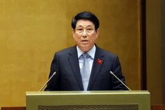 Президент государства Лыонг Кыонг представляет Отчёт о результатах деятельности за срок полномочий 2021–2026 годов. (Фото: ВИА)