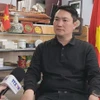 Нгуен Мань Хунг, директор Вьетнамского офиса по продвижению торговли в Нью-Йорке, дает интервью Вьетнамскому информационному агентству (ВИА). (Фото: ВИА) 