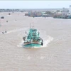 Рыболовные суда в устье реки Док, провинция Ка-Мау. (Фото: ВИА) 