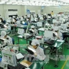 Линия по производству электронных компонентов на предприятии Flexcom Vietnam Co., Ltd. в промышленном парке Йенфонг, провинция Бакнинь. (Фото: ВИA)