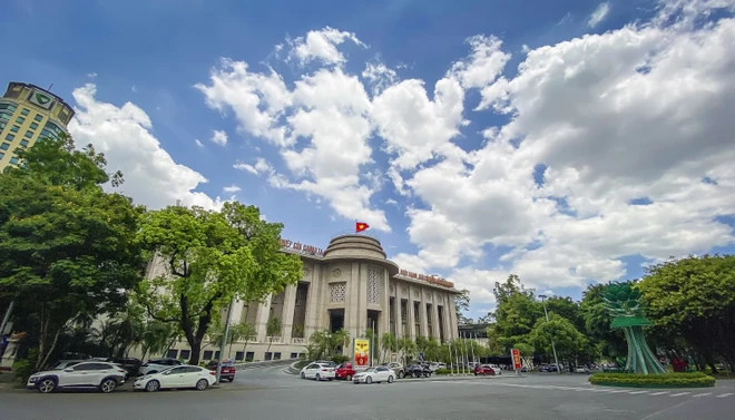 UOB считает, что центральный банк будет поддерживать стабильные процентные ставки. (Фото: Vietnam+) 2.png