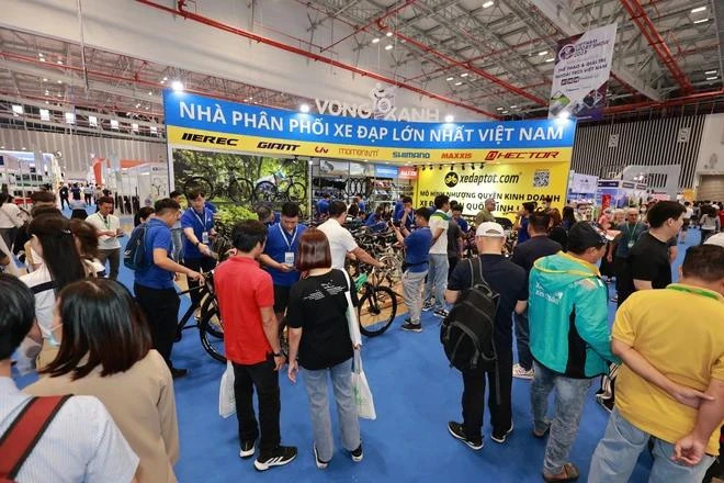 Люди на мероприятии по продвижению торговли. (Фото: VietnamPlus) 2.png