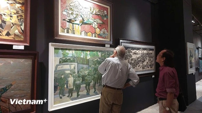 Посетители на мероприятии (Фото: VietnamPlus) 3.png