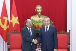 Генеральный секретарь То Лам принял Посла Индии во Вьетнаме Сандипа Арью. Фото: ВИА.