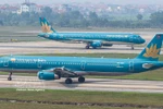 Самолёт авиакомпании Vietnam Airlines в одном из аэропортов Вьетнама. Фото: Vietnam+.