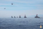 Авиагруппа DHC6 и противолодочные вертолёты Ка28 вместе с ракетными кораблями принимают участие в морском параде. Фото: ВИА.