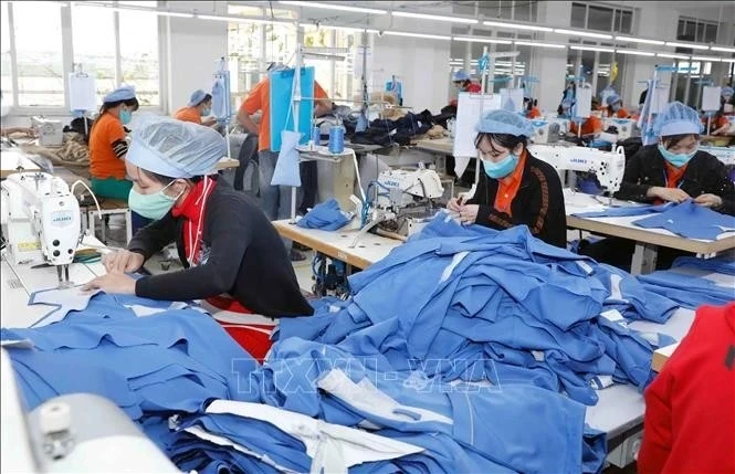 Производство швейной продукции на экспорт в Японию на предприятии Hung Viet Garment в провинции Хынгйен. (Фото: ВИА)