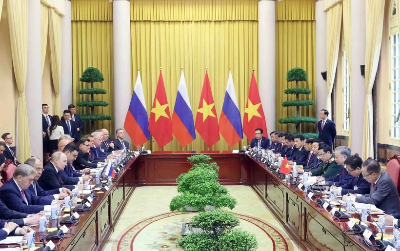Президент Вьетнама То Лам (ныне — Генеральный секретарь ЦК КПВ То Лам) провёл переговоры с Президентом Российской Федерации Владимиром Путиным, прибывшим с государственным визитом во Вьетнам днём 20 июня 2024 года в Дворце Президента. Фото: ВИА.