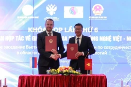 Обе стороны подписали Протокол заседания (Фото: https://mst.gov.vn)