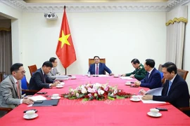 Премьер-министр Фам Минь Тьинь провёл телефонный разговор с Премьер-министром Малайзии Анваром Ибрагимом (Фото: ВИА)