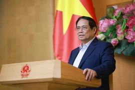 Премьер-министр Фам Минь Тьинь председательствует на 6-м заседании Руководящего комитета по ликвидации временных и ветхих домов (Фото: ВИА)