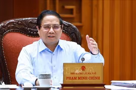 Премьер-министр Фам Минь Тьинь провел заседание постоянного правительства с министерствами, ведомствами и правительственной делегацией по переговорам по вопросам торговли с США (Фото: ВИА)