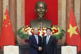 Президент Лыонг Кыонг принял Председателя ВСНП Чжао Лэцзи (Фото: ВИА)