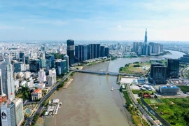 Городская территория Хошимина по обе стороны реки Сайгон в районе Тхудык и 1-м районе развивается в современном стиле, открывая новые пространства и импульсы для роста (Фото: www.qdnd.vn)