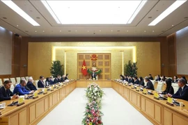 Премьер-министр Фам Минь Тьинь принимает швейцарские и европейские предприятия. (Фото: ВИА)