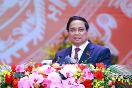 Премьер-министр Фам Минь Тьинь выступает с речью по случаю 80-летия со дня основания Правительства. (Фото: ВИА)