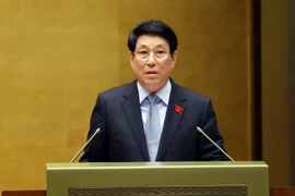 Президент государства Лыонг Кыонг представляет Отчёт о результатах деятельности за срок полномочий 2021–2026 годов. (Фото: ВИА)