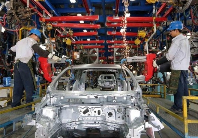 Линия по производству и сборке автомобилей на заводе Ford в Хайзыонге (Фото: ВИА) day-chuyen-san-xuat-lap-xe-ford-tai-nha-may-ford-hai-duong-anh-ttxvn.jpg