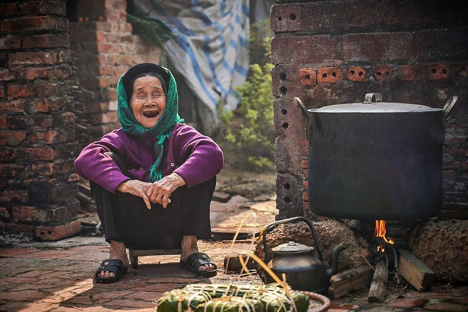 Счастье пожилых членов семьи во время праздника Тэт и прихода весны. (Фото: ВИA)