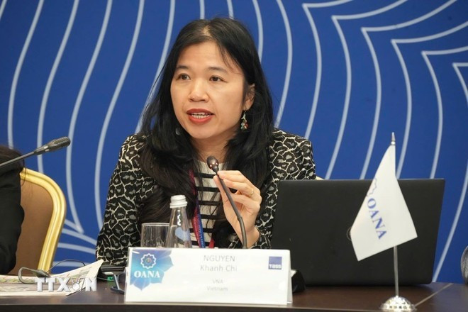 Руководитель информационного отдела Vietnam News Нгуен Кхань Чи выступает с речью на 19-й Генеральной ассамблее OANA. (Фото: ВИA)