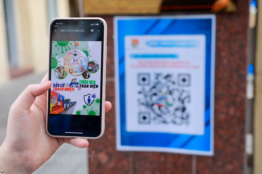 QR-коды для предвыборной агитации и для медицинской декларации будут распространены во всех организациях - членах Союза в Ханое во время выборов. (Фото: Vietnam+)
