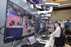 Посетители выставки технологического оборудования в сфере кибербезопасности. Фото: ВИА.