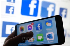 Скорость мобильного интернета (во Вьетнаме в июле 2024 года увеличилась в 1,4 раза, а скорость загрузки — в 1,2 раза по сравнению с мартом 2024 года). Иллюстративное фото. Фото: AFP/ВИА.