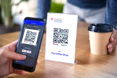 Средний рост числа транзакций через QR-код в течение года составил 471,13%. (Фото: Vietnam+)