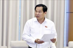 Назначение господина Ле Куанг Маня на должность постоянного заместителя заведующего Канцелярией Национального собрания. Фото: ВИА.