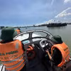 Офицеры и бойцы пограничного поста Шонча Управления пограничных войск города Дананг выполняют задачу по патрулированию в районе морских ворот Дананга. (Фото: ВИА).