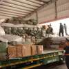 Таможенные силы осуществляют контроль транспортных средств и импортируемых товаров на международном пограничном пункте пропуска Хыунги (провинция Лангшон). (Фото: ВИА)