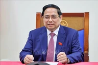 Премьер-министр Фам Минь Тьинь провёл телефонный разговор с генеральным директором Государственной корпорации по атомной энергии Российской Федерации «Росатом» Алексеем Лихачёвым. (Фото: ВИА).