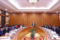 Генеральный секретарь То Лам провёл рабочее совещание с Постоянными членами Подкомитетов XIV съезда партии. (Фото: ВИА).