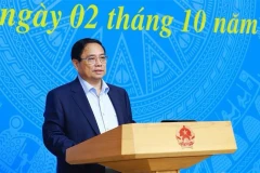 Премьер-министр Фам Минь Тьинь выступает на пятом заседании Национального руководящего комитета по выполнению обязательств Вьетнама на 26-й Конференции ООН по изменению климата (COP26) в Ханое 2 октября (Фото: ВИA)