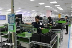 Рабочие на заводе компании Samsung Electronics Vietnam Co. Ltd в уезде Йенфонг, провинция Бакнинь. (ВИA)
